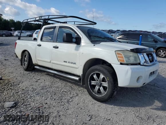 ✅ 2010 Nissan Titan SE • VIN: 1N6BA0ED1AN314971 • Lot: 64844985. Listed on Copart with 306,987 mi. Free auction sales archive from the USA and detailed vehicle history report at DreamBid. Image 4.