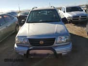 ✅ 2003 Suzuki Vitara • VIN: 2S3TE52V936103483 • Lot: 82235884. Listed on Copart with 173,354 mi. Free auction sales archive from the USA and detailed vehicle history report at DreamBid. Image 5.