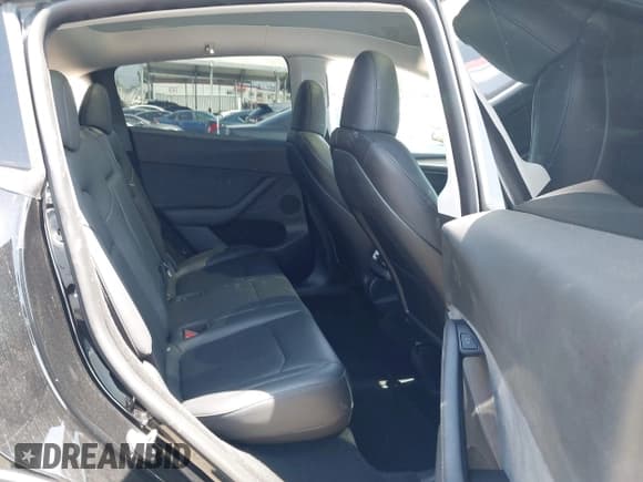 ✅ 2023 Tesla Model Y Long Range • VIN: 7SAYGDEE0PA023719 • Lot: 41974415. Listed on IAAI with 50,152 mi. Free auction sales archive from the USA and detailed vehicle history report at DreamBid. Image 8.
