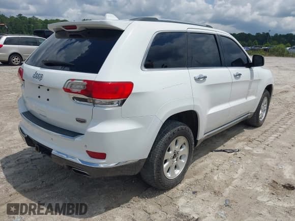 ✅ 2015 Jeep Grand Cherokee • VIN: 1C4RJEJM8FC674648 • Lot: 42785823. Listed on IAAI with 207,084 mi. Free auction sales archive from the USA and detailed vehicle history report at DreamBid. Image 4.
