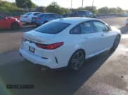 ✅ 2023 BMW 2 Series 228i • VIN: WBA53AK0XP7N00648 • Lot: 42989478. Listed on IAAI with 22,772 mi. Free auction sales archive from the USA and detailed vehicle history report at DreamBid. Image 4.