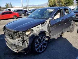 ✅ 2018 BMW X2 sDrive28i • VIN: WBXYJ3C36JEP76244 • Lot: 38732563. Listed on Copart with 50,424 mi. Free auction sales archive from the USA and detailed vehicle history report at DreamBid. Image 1.
