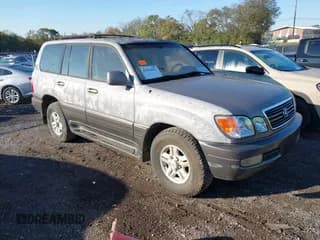 ✅ 1999 Lexus LX 470 • VIN: JT6HT00W1X0040328 • Lot: 43594842. Wystawiony na IAAI z przebiegiem 240 798 mil. Bezpłatny archiwum sprzedaży aukcyjnych z USA i szczegółowy raport historii pojazdu na DreamBid. Zdjęcie 1.