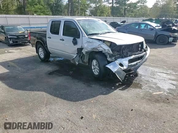 2014 Nissan Frontier Desert Runner z VIN 1N6AD0ER3EN735742, wystawiony jako Copart lot #88541935 z przebiegiem 227 969 mil mil oraz Szkoda całkowita • Salvage title. Historia ofert i sprzedaży dostępna na DreamBid. Obrazek 13.