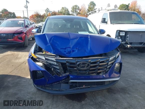 ✅ 2022 Hyundai Tucson SE • VIN: 5NMJA3AE0NH007471 • Lot: 43619379. Listed on IAAI with 64,785 mi. Free auction sales archive from the USA and detailed vehicle history report at DreamBid. Image 12.