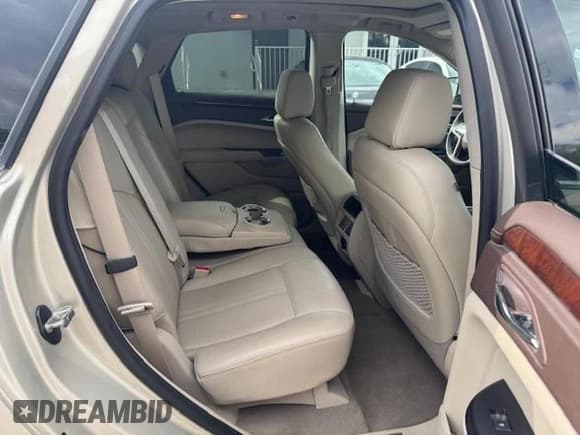 ✅ 2013 Cadillac SRX Luxury Collection • VIN: 3GYFNCE32DS647198 • Lot: 62613475. Wystawiony na Copart z przebiegiem 58 537 mil. Bezpłatny archiwum sprzedaży aukcyjnych z USA i szczegółowy raport historii pojazdu na DreamBid. Zdjęcie 11.