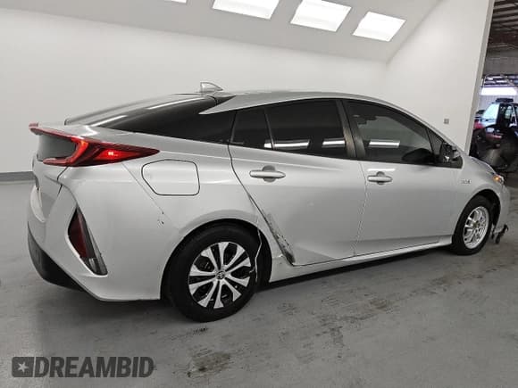 ✅ 2021 Toyota Prius LE • VIN: JTDKAMFPXM3190461 • Лот: 85264545. Опубликован ранее на Copart с пробегом 149 598 миль. Бесплатный доступ к архиву аукционных продаж из США и подробный отчёт об истории автомобиля на DreamBid. Изображение 3.
