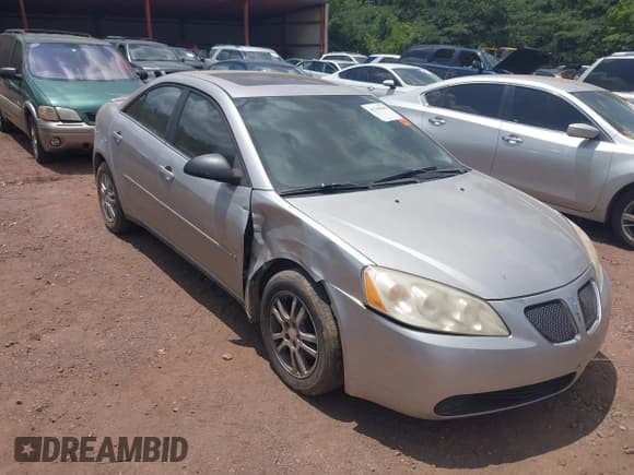 ✅ 2006 Pontiac G6 6-Cyl • VIN: 1G2ZG558564271124 • Lot: 42743040. Wystawiony na IAAI z przebiegiem 165 294 mil. Bezpłatny archiwum sprzedaży aukcyjnych z USA i szczegółowy raport historii pojazdu na DreamBid. Zdjęcie 1.