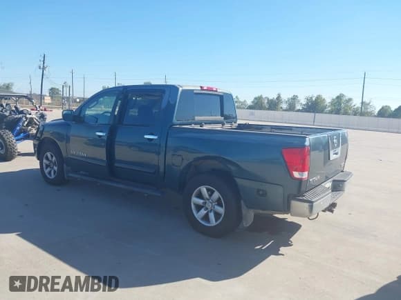 ✅ 2005 Nissan Titan XE • VIN: 1N6BA07AX5N563374 • Lot: 43627413. Listed on IAAI with 151,817 mi. Free auction sales archive from the USA and detailed vehicle history report at DreamBid. Image 3.