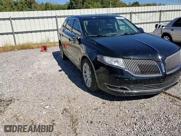 ✅ 2016 Lincoln MKT • VIN: 2LMHJ5FK7GBL03162 • Lot: 87295875. Wystawiony na Copart z przebiegiem 153 473 mil. Bezpłatny archiwum sprzedaży aukcyjnych z USA i szczegółowy raport historii pojazdu na DreamBid. Zdjęcie 14.