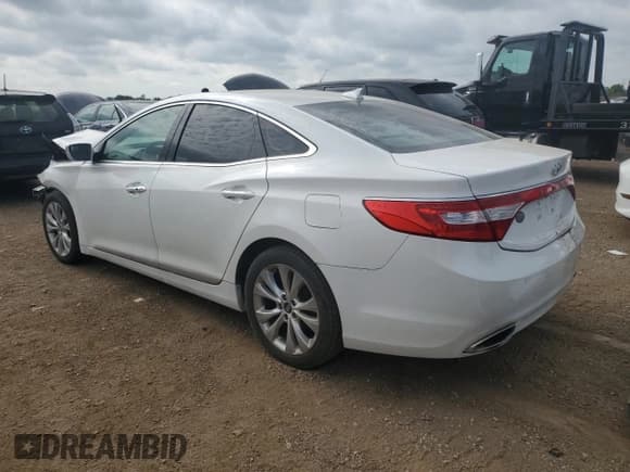 ✅ 2013 Hyundai Azera • VIN: KMHFG4JGXDA215602 • Лот: 66165305. Опубликован ранее на Copart с пробегом 119 166 миль. Бесплатный доступ к архиву аукционных продаж из США и подробный отчёт об истории автомобиля на DreamBid. Изображение 2.