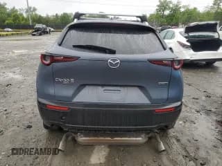 ✅ 2021 Mazda CX-30 Premium • VIN: 3MVDMBDM7MM222762 • Lot: 54825104. Wystawiony na Copart z przebiegiem 27 517 mil. Bezpłatny archiwum sprzedaży aukcyjnych z USA i szczegółowy raport historii pojazdu na DreamBid. Zdjęcie 6.