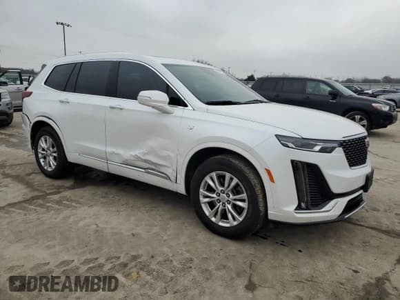 ✅ 2024 Cadillac XT6 FWD Luxury • VIN: 1GYKPAR47RZ720446 • Lot: 43964105. Listed on Copart with 10,728 mi. Free auction sales archive from the USA and detailed vehicle history report at DreamBid. Image 4.