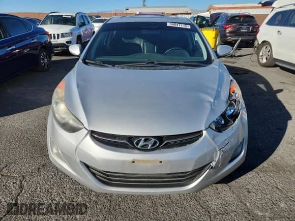 2011 Hyundai Elantra GLS z VIN KMHDH4AE0BU137555, wystawiony jako Copart lot #90941115 z przebiegiem 193 538 mil mil oraz Szkoda całkowita • Salvage title. Historia ofert i sprzedaży dostępna na DreamBid. Obrazek 5.