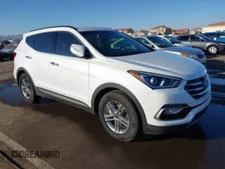 2018 Hyundai Santa Fe 2.4L z VIN 5XYZU3LB5JG542605, wystawiony jako IAAI lot #43539148 z przebiegiem 18 839 mil mil oraz . Historia ofert i sprzedaży dostępna na DreamBid. Obrazek 1.