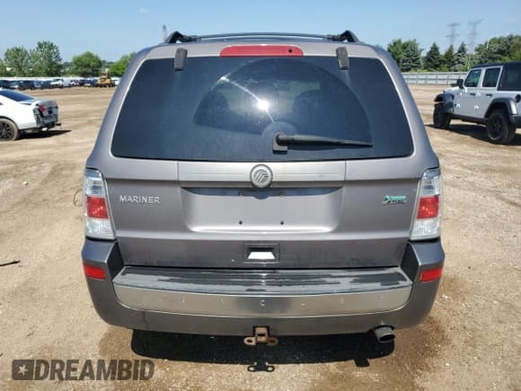 ✅ 2010 Mercury Mariner • VIN: 4M2CN9BG9AKJ17511 • Lot: 63789835. Listed on Copart with 152,609 mi. Free auction sales archive from the USA and detailed vehicle history report at DreamBid. Image 6.