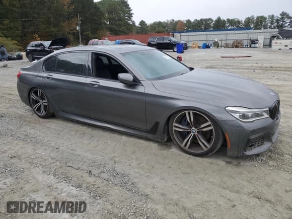 ✅ 2017 BMW 7 Series 750i • VIN: WBA7F0C57HGM21279 • Lot: 90692325. Wystawiony na Copart z przebiegiem 122 955 mil. Bezpłatny archiwum sprzedaży aukcyjnych z USA i szczegółowy raport historii pojazdu na DreamBid. Zdjęcie 4.