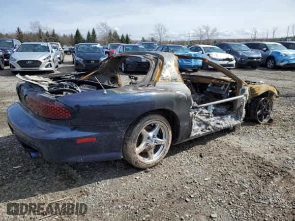 ✅ 1999 Pontiac Firebird Formula • VIN: 2G2FV22G0X2223301 • Лот: 52555795. Опубликован ранее на Copart с пробегом Не указан. Бесплатный доступ к архиву аукционных продаж из США и подробный отчёт об истории автомобиля на DreamBid. Изображение 3.