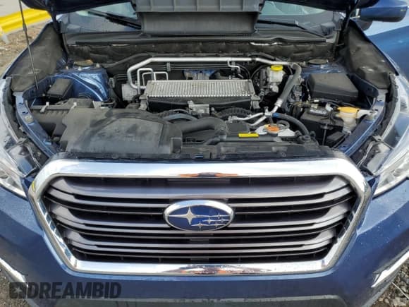 ✅ 2021 Subaru Ascent Premium • VIN: 4S4WMAFDXM3472222 • Lot: 66188315. Listed on Copart with 82,505 mi. Free auction sales archive from the USA and detailed vehicle history report at DreamBid. Image 12.