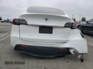 ✅ 2022 Tesla Model Y Long Range • VIN: 7SAYGDEE5NF352075 • Lot: 50799895. Wystawiony na Copart z przebiegiem 11 597 mil. Bezpłatny archiwum sprzedaży aukcyjnych z USA i szczegółowy raport historii pojazdu na DreamBid. Zdjęcie 6.