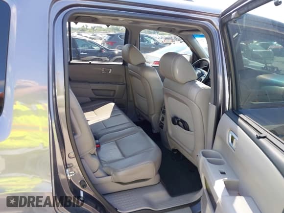✅ 2015 Honda Pilot Touring • VIN: 5FNYF3H95FB014847 • Lot: 43123084. Listed on IAAI with 150,425 mi. Free auction sales archive from the USA and detailed vehicle history report at DreamBid. Image 8.
