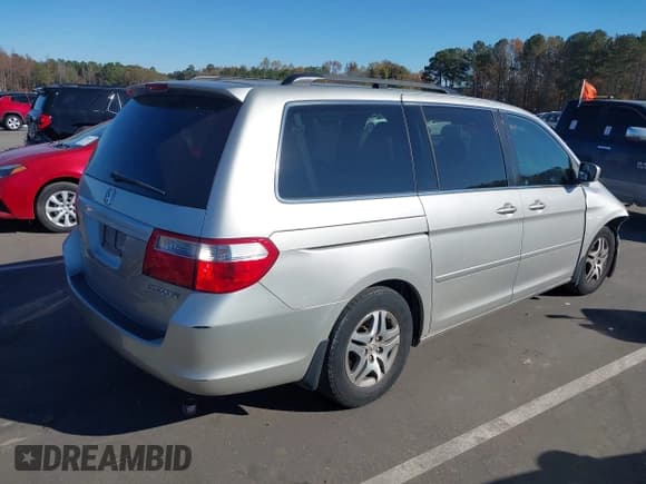 ✅ 2005 Honda Odyssey EX-L • VIN: 5FNRL38655B036820 • Lot: 43633450. Listed on IAAI with 207,568 mi. Free auction sales archive from the USA and detailed vehicle history report at DreamBid. Image 4.