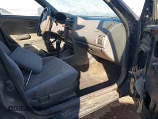 ✅ 2001 Suzuki Esteem GL • VIN: JS2GB41W515201910 • Lot: 41646209. Wystawiony na IAAI z przebiegiem 326 239 mil. Bezpłatny archiwum sprzedaży aukcyjnych z USA i szczegółowy raport historii pojazdu na DreamBid. Zdjęcie 5.