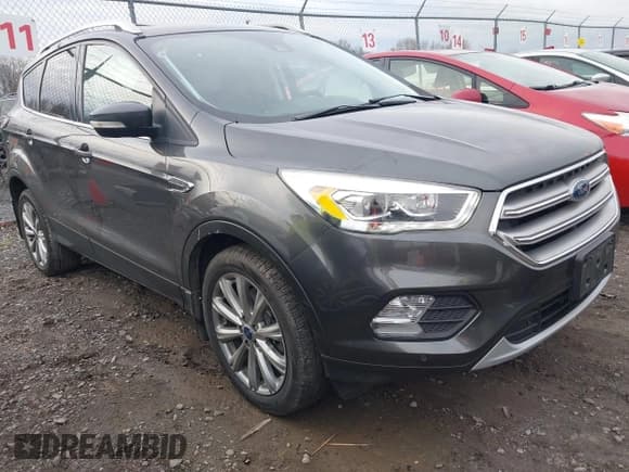 ✅ 2017 Ford Escape Titanium • VIN: 1FMCU9J95HUE81320 • Lot: 43612877. Listed on IAAI with 78,653 mi. Free auction sales archive from the USA and detailed vehicle history report at DreamBid. Image 1.