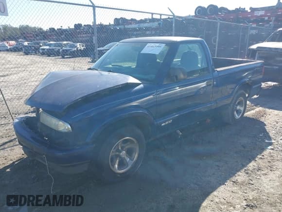 ✅ 2003 Chevrolet S-10 Work Truck • VIN: 1GCCS14X938129431 • Лот: 41463999. Опубликован ранее на IAAI с пробегом 338 054 миль. Бесплатный доступ к архиву аукционных продаж из США и подробный отчёт об истории автомобиля на DreamBid. Изображение 2.