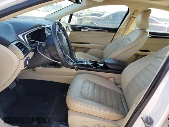 ✅ 2016 Ford Fusion SE Hybrid • VIN: 3FA6P0LU9GR157112 • Lot: 80173065. Listed on Copart with 84,969 mi. Free auction sales archive from the USA and detailed vehicle history report at DreamBid. Image 7.