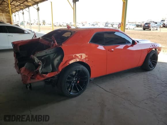 ✅ 2022 Dodge Challenger SRT Hellcat Redeye Widebody • VIN: 2C3CDZL99NH242003 • Lot: 38351624. Wystawiony na Copart z przebiegiem 6 876 mil. Bezpłatny archiwum sprzedaży aukcyjnych z USA i szczegółowy raport historii pojazdu na DreamBid. Zdjęcie 3.