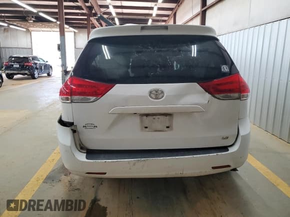✅ 2012 Toyota Sienna LE AAS • VIN: 5TDKK3DC1CS269618 • Lot: 49789095. Listed on Copart with Not provided. Free auction sales archive from the USA and detailed vehicle history report at DreamBid. Image 6.