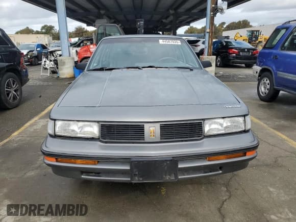 ✅ 1988 Oldsmobile Cutlass • VIN: 2G3AJ5133J2335499 • Lot: 44587035. Listed on Copart with 90,432 mi. Free auction sales archive from the USA and detailed vehicle history report at DreamBid. Image 5.
