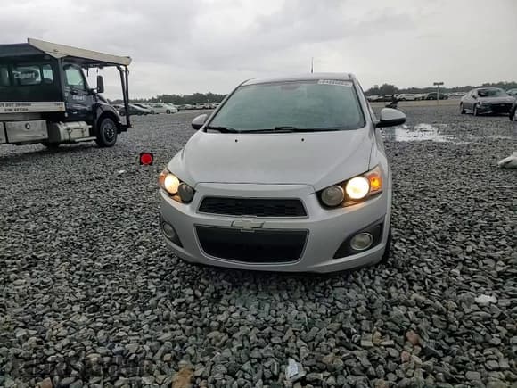 ✅ 2012 Chevrolet Sonic LTZ • VIN: 1G1JE6SH7C4123988 • Lot: 64845065. Listed on Copart with 130,139 mi. Free auction sales archive from the USA and detailed vehicle history report at DreamBid. Image 13.