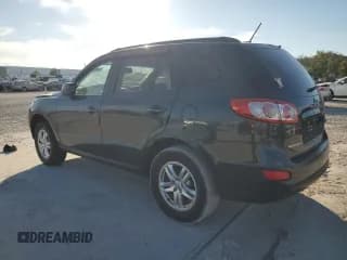 ✅ 2012 Hyundai Santa Fe GLS • VIN: 5XYZG3AB6CG115642 • Lot: 77754754. Listed on Copart with 96,943 mi. Free auction sales archive from the USA and detailed vehicle history report at DreamBid. Image 2.