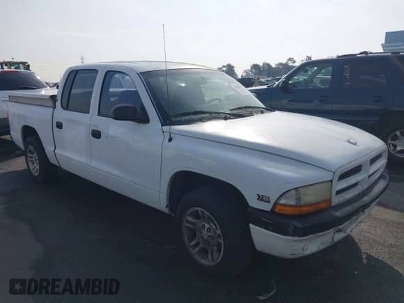 ✅ 2000 Dodge Dakota Sport • VIN: 1B7GL2AN8YS654014 • Лот: 41470554. Размещён на IAAI с пробегом 181 931 миль миль. Получите бесплатный доступ к архиву аукционных продаж из США и посмотрите подробный отчёт об истории автомобиля на DreamBid. Изображение 13.