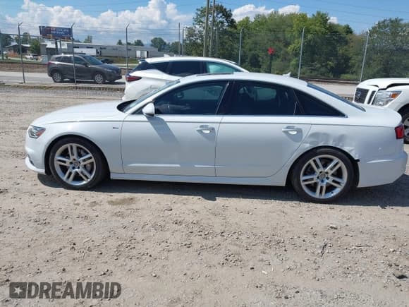 ✅ 2016 Audi A6 Premium Plus • VIN: WAUGFAFC7GN009857 • Lot: 43258709. Wystawiony na IAAI z przebiegiem 143 043 mil. Bezpłatny archiwum sprzedaży aukcyjnych z USA i szczegółowy raport historii pojazdu na DreamBid. Zdjęcie 14.