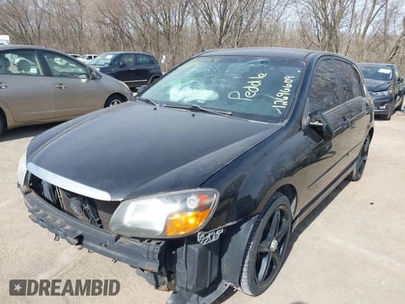 ✅ 2008 Kia Spectra • VIN: KNAFE161885017559 • Лот: 41829231. Опубликован ранее на IAAI с пробегом 263 721 миль. Бесплатный доступ к архиву аукционных продаж из США и подробный отчёт об истории автомобиля на DreamBid. Изображение 2.