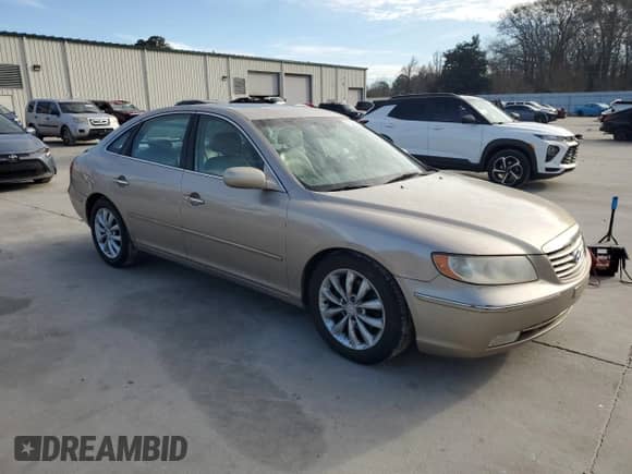 2006 Hyundai Azera SE с VIN KMHFC46F86A109521, выставлен на аукционе Copart как лот 42508805 с пробегом 215 583 миль миль и Списание • Salvage title. История ставок и продаж доступна на DreamBid. Изображение 4.