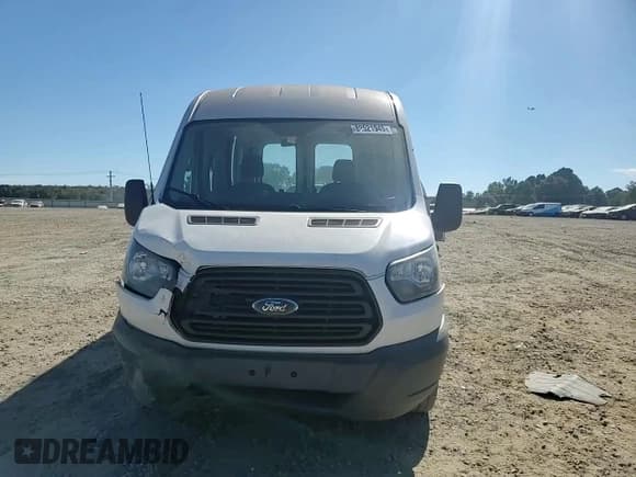 ✅ 2015 Ford Transit Cargo • VIN: 1FTYR1CM9FKA24727 • Lot: 82521945. Wystawiony na Copart z przebiegiem 214 051 mil. Bezpłatny archiwum sprzedaży aukcyjnych z USA i szczegółowy raport historii pojazdu na DreamBid. Zdjęcie 14.