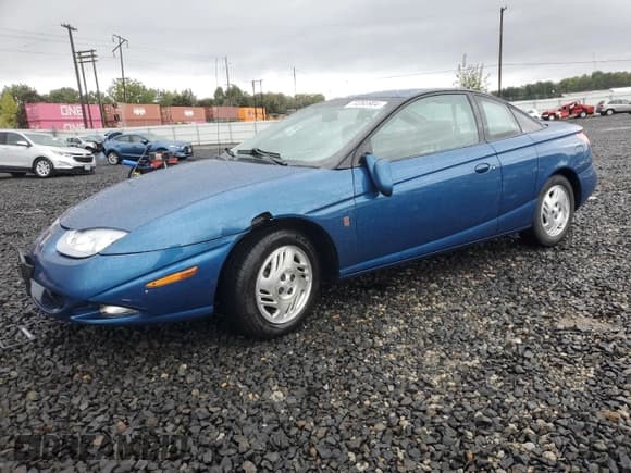 ✅ 2001 Saturn SC • VIN: 1G8ZR12791Z118164 • Лот: 74393904. Опубликован ранее на Copart с пробегом 158 308 миль. Бесплатный доступ к архиву аукционных продаж из США и подробный отчёт об истории автомобиля на DreamBid. Изображение 1.