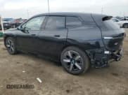 ✅ 2024 BMW iX xDrive50 • VIN: WB523CF01RCN55992 • Лот: 59352604. Опубликован ранее на Copart с пробегом 8 415 миль. Бесплатный доступ к архиву аукционных продаж из США и подробный отчёт об истории автомобиля на DreamBid. Изображение 2.