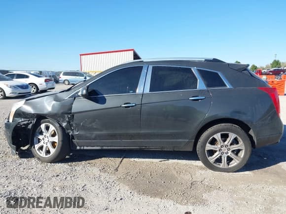 ✅ 2016 Cadillac SRX Performance Collection • VIN: 3GYFNCE35GS534785 • Lot: 43384549. Wystawiony na IAAI z przebiegiem 92 304 mil. Bezpłatny archiwum sprzedaży aukcyjnych z USA i szczegółowy raport historii pojazdu na DreamBid. Zdjęcie 14.