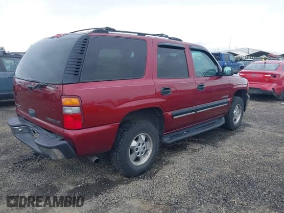 2001 Chevrolet Tahoe LT with VIN 1GNEK13T51R217446, listed as a IAAI auction lot 41970321 with 196,766 mi miles and . Bid and sale history available at DreamBid. Image 4.