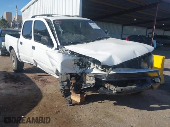 ✅ 2002 Toyota Tacoma PreRunner • VIN: 5TEGN92N12Z898950 • Lot: 43078464. Listed on IAAI with 265,021 mi. Free auction sales archive from the USA and detailed vehicle history report at DreamBid. Image 6.