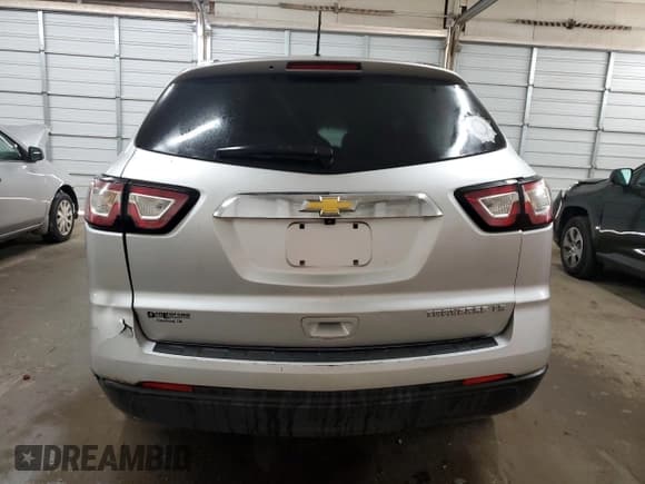 ✅ 2014 Chevrolet Traverse LS • VIN: 1GNKRFKD2EJ240340 • Lot: 69561564. Wystawiony na Copart z przebiegiem Nie podano. Bezpłatny archiwum sprzedaży aukcyjnych z USA i szczegółowy raport historii pojazdu na DreamBid. Zdjęcie 6.