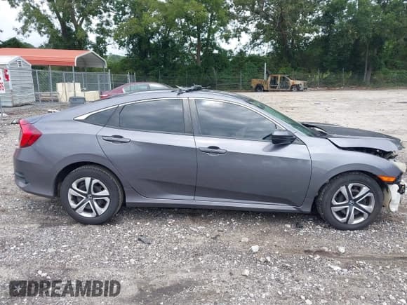 ✅ 2016 Honda Civic LX • VIN: 2HGFC2F57GH510952 • Lot: 42958157. Listed on IAAI with 143,790 mi. Free auction sales archive from the USA and detailed vehicle history report at DreamBid. Image 14.
