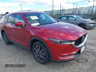 ✅ 2018 Mazda CX-5 Grand Touring • VIN: JM3KFBDM0J0342007 • Lot: 43603462. Wystawiony na IAAI z przebiegiem 90 570 mil. Bezpłatny archiwum sprzedaży aukcyjnych z USA i szczegółowy raport historii pojazdu na DreamBid. Zdjęcie 1.