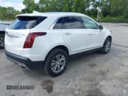 ✅ 2022 Cadillac XT5 FWD Premium Luxury • VIN: 1GYKNCRS3NZ182709 • Lot: 43384902. Wystawiony na IAAI z przebiegiem 91 161 mil. Bezpłatny archiwum sprzedaży aukcyjnych z USA i szczegółowy raport historii pojazdu na DreamBid. Zdjęcie 4.