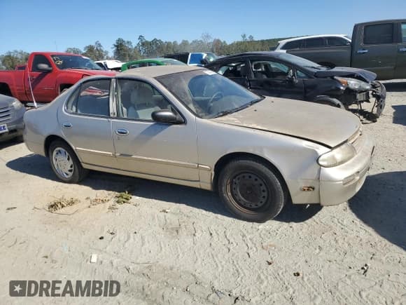 ✅ 1996 Nissan Altima XE • VIN: 1N4BU31D5TC104895 • Лот: 77043684. Опубликован ранее на Copart с пробегом 133 113 миль. Бесплатный доступ к архиву аукционных продаж из США и подробный отчёт об истории автомобиля на DreamBid. Изображение 4.